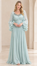 Front full-length view of model wearing Mint Green pleated chiffon maxi dress with embellished neckline and ruffle cuffs