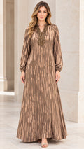 Front view of woman wearing Bronze beaded V-neck long sleeve maxi dress
