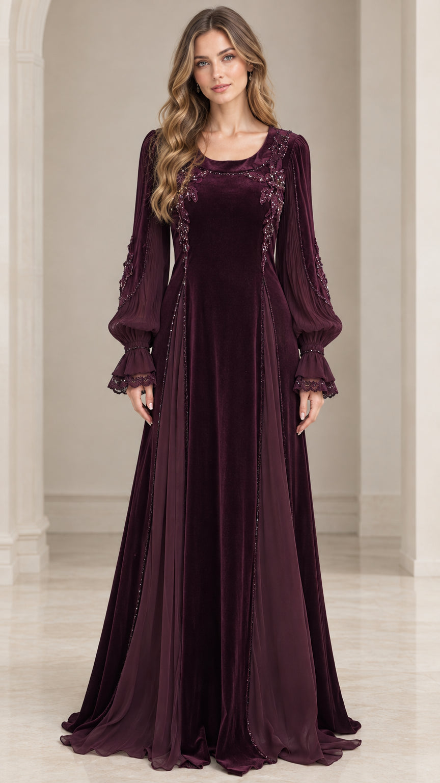 Front view of woman wearing burgundy velvet maxi evening gown with sheer bishop sleeves
