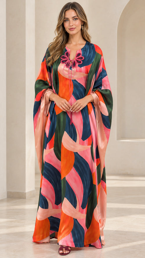 Front full-length view of model wearing Navy Multicolor abstract print kaftan maxi dress