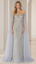 Front view of model wearing a slate blue beaded off-the-shoulder mermaid gown with sheer cape sleeves
