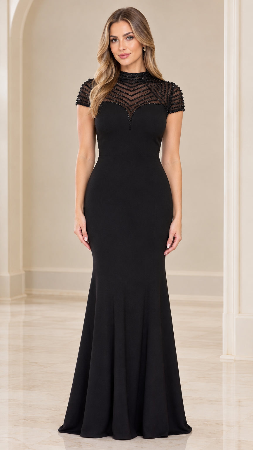 Full-length front view of black beaded illusion high-neck mermaid evening gown