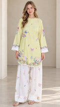 Front view of model wearing Light Yellow floral tunic and white wide leg pants set