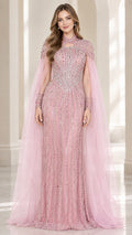 Front view of model wearing dusty pink beaded evening gown with sheer cape