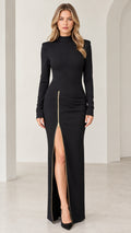 Full front view of black long sleeve mock neck maxi dress with zipper front slit