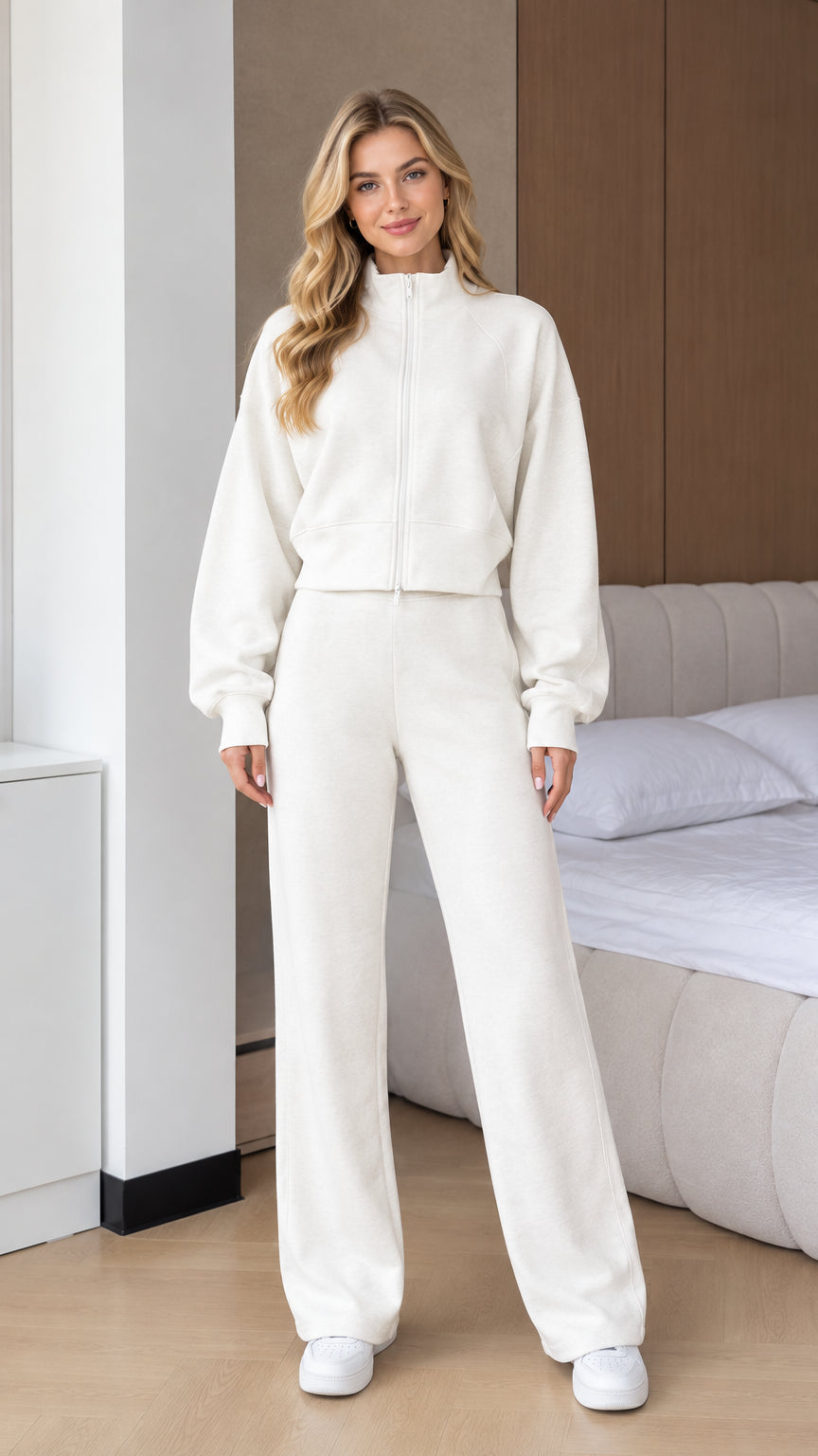 Front full view of woman wearing Off White 2-piece zip-up sweatshirt and wide leg pants set