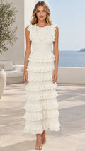 Front view of model wearing white sleeveless tiered ruffle maxi dress