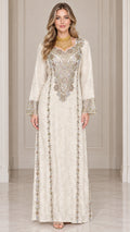 Front full-length view of woman wearing ivory embroidered long sleeve maxi kaftan dress