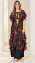 Front full view of woman wearing Black Multi floral layered chiffon maxi dress with flutter sleeves