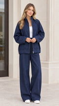 Women's casual zip-up jacket and wide-leg pants set in navy blue front view