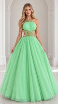 Front view of model wearing mint green halter beaded cutout tulle ball gown
