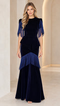Full front view of navy blue velvet fringe peplum evening maxi dress