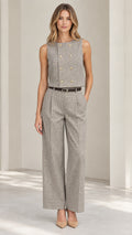 Front full view of women's grey houndstooth sleeveless vest and wide leg pants set with belt