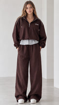 Front full view of women's chocolate brown half-zip layered pullover and wide-leg tracksuit set
