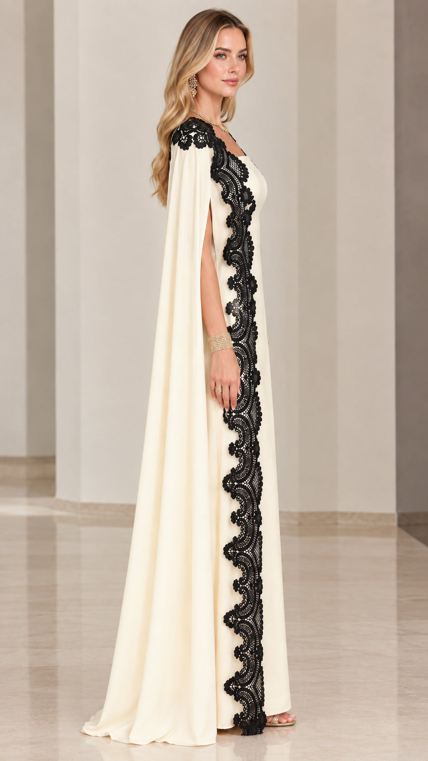 Side profile of cream evening dress with flowing floor-length cape