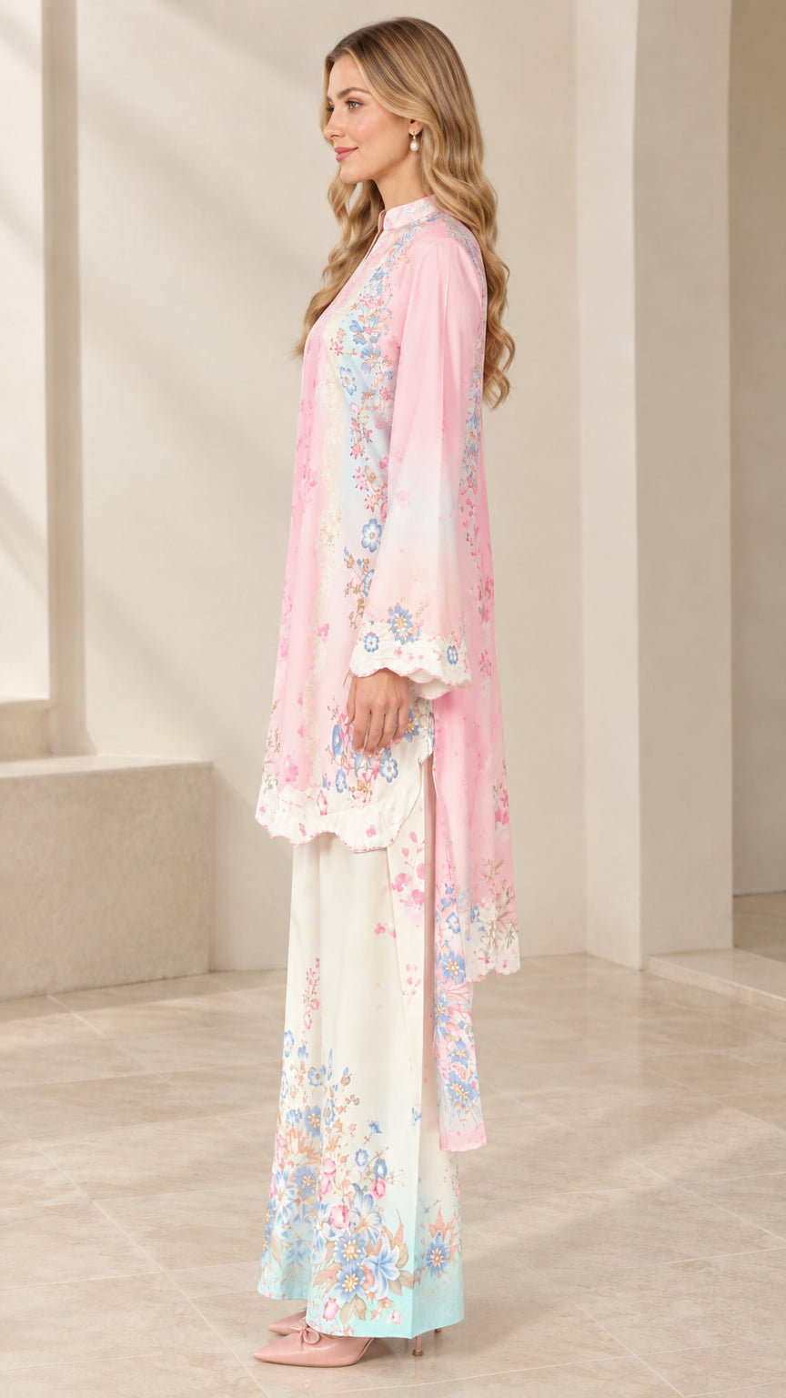 Side profile of pink floral print tunic set showing drape and matching dupatta