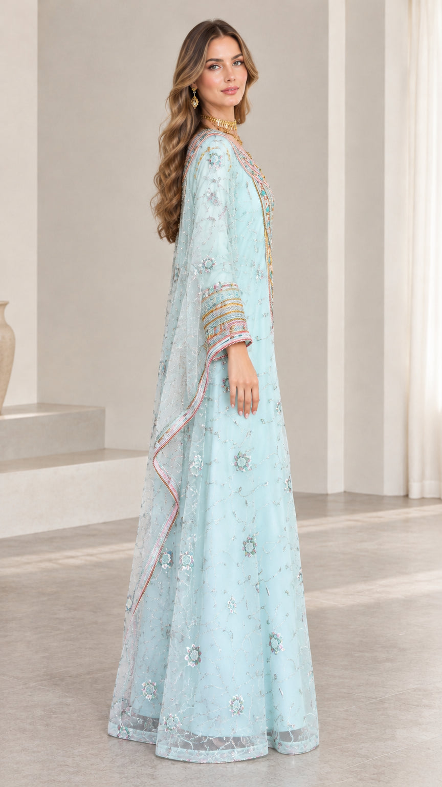 Side angle view of woman wearing sky blue embroidered evening kaftan dress