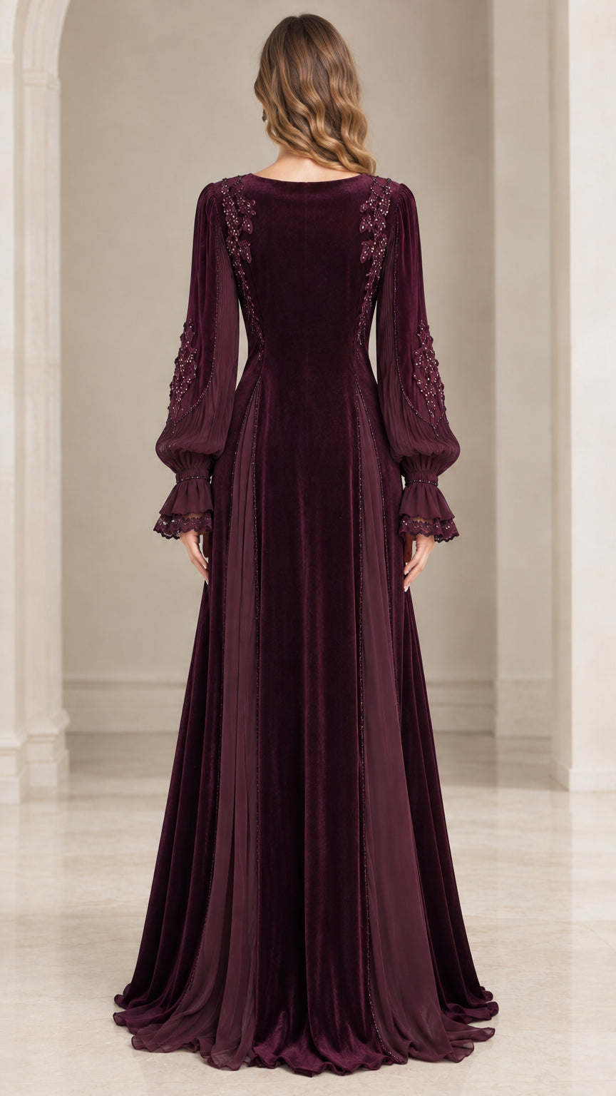 Back view of burgundy velvet maxi gown with beaded shoulder embroidery