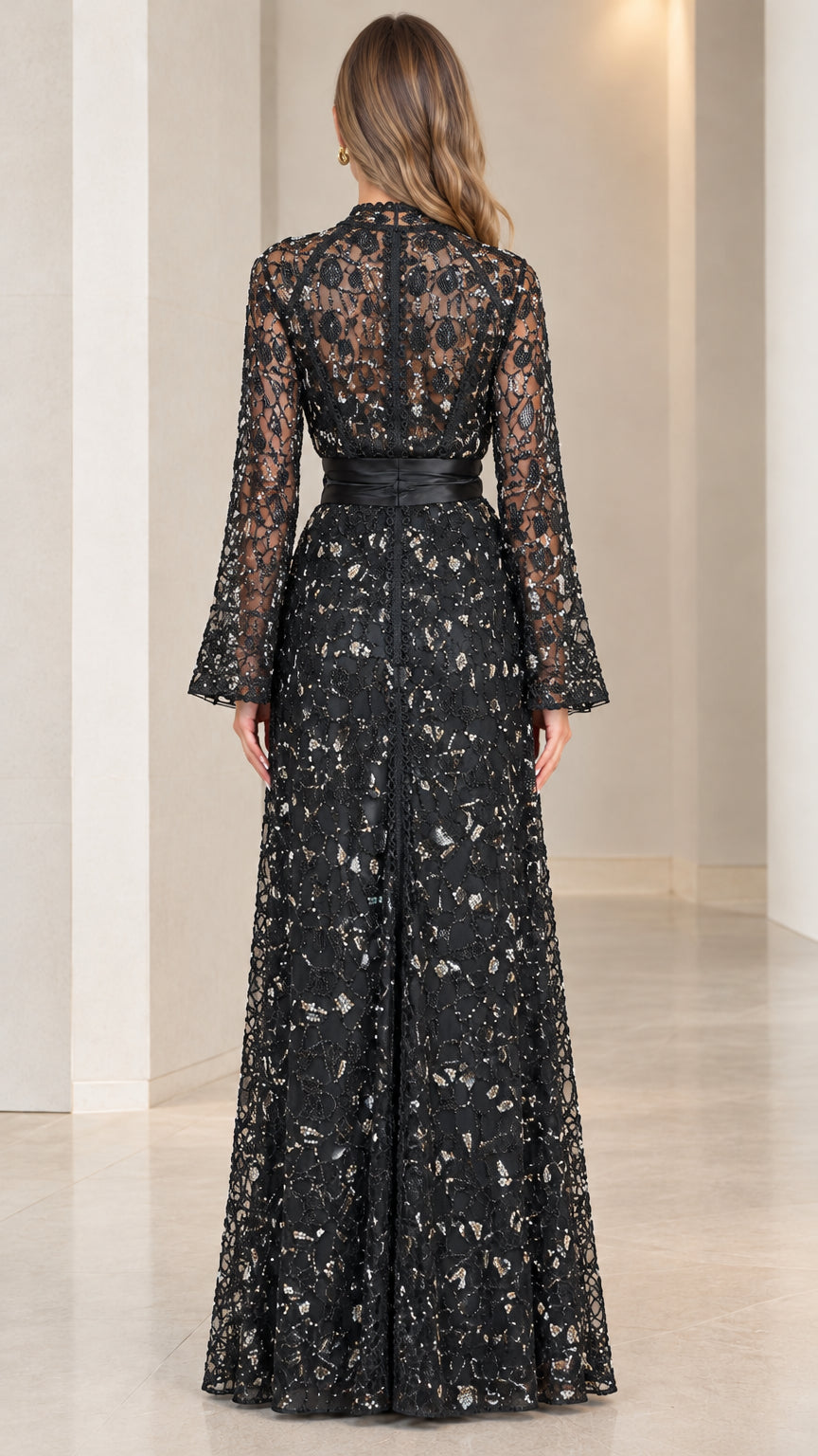 Back view of model wearing the black floral sequin lace duster dress set