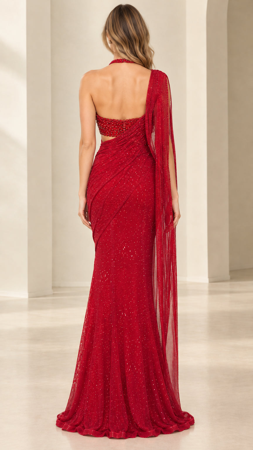Back view of model in red draped sequin evening dress