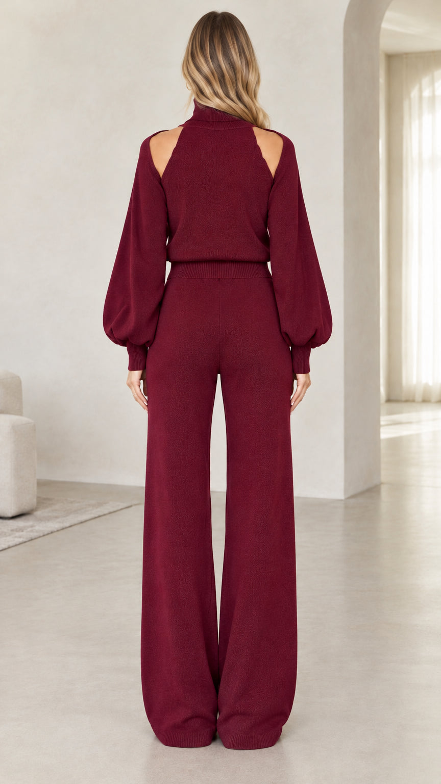 Back view of burgundy cutout knit top and matching wide-leg knit pants
