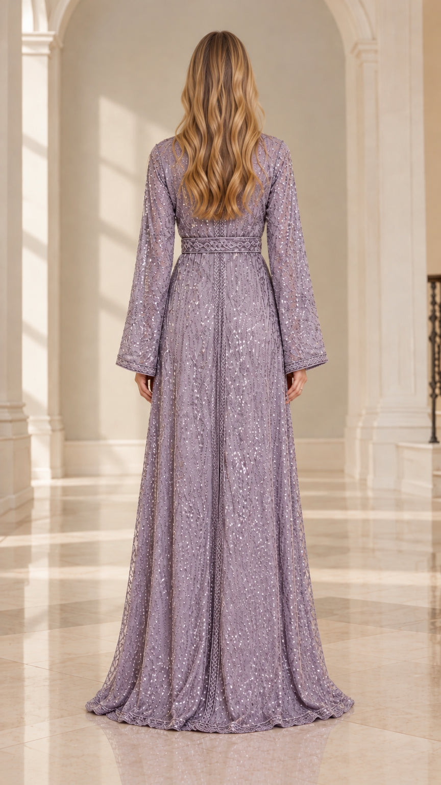Back full-length view of woman wearing Lilac sequin embroidered evening gown
