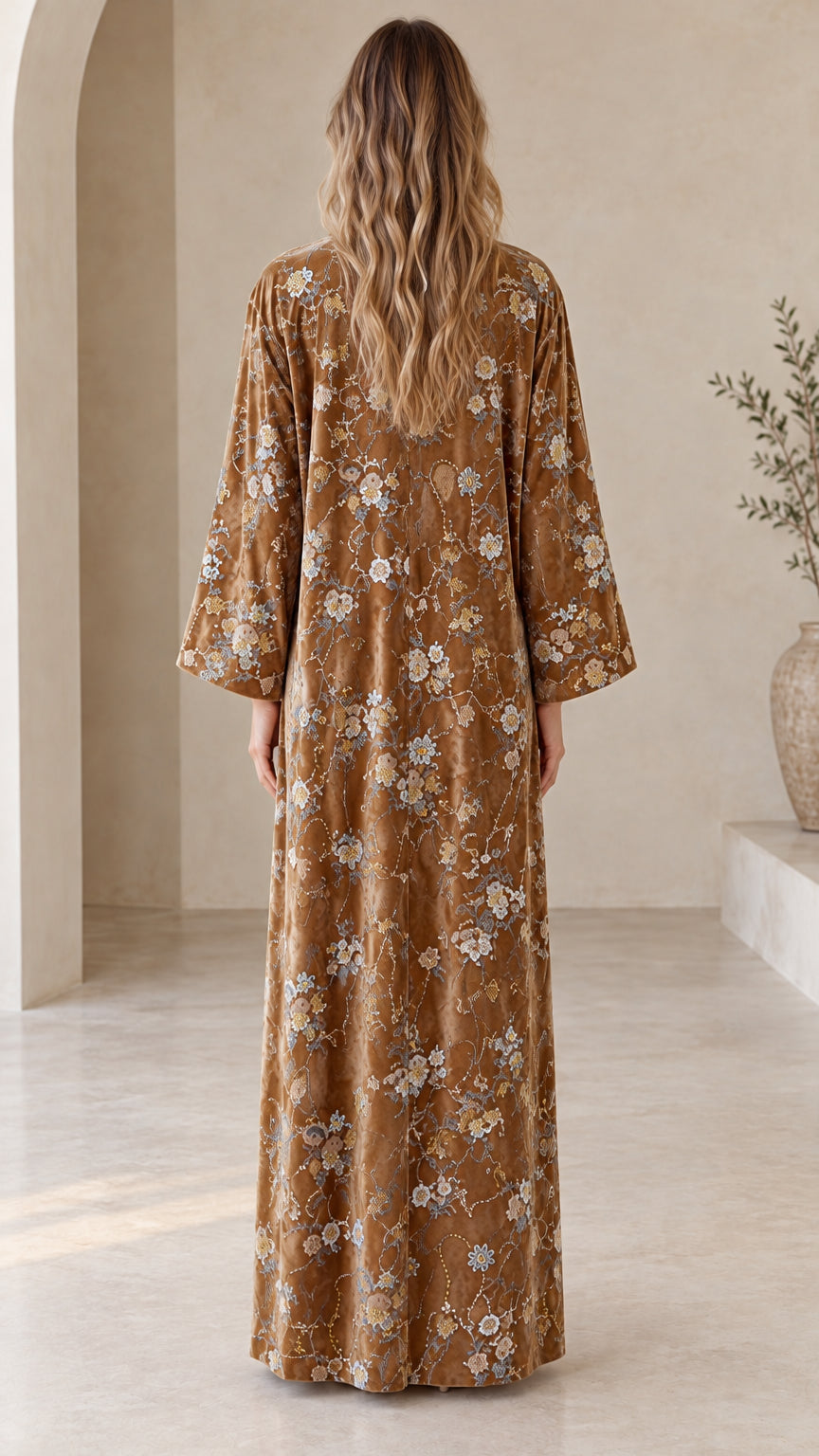 Back view of model wearing the floor-length Camel Brown embroidered velvet kimono
