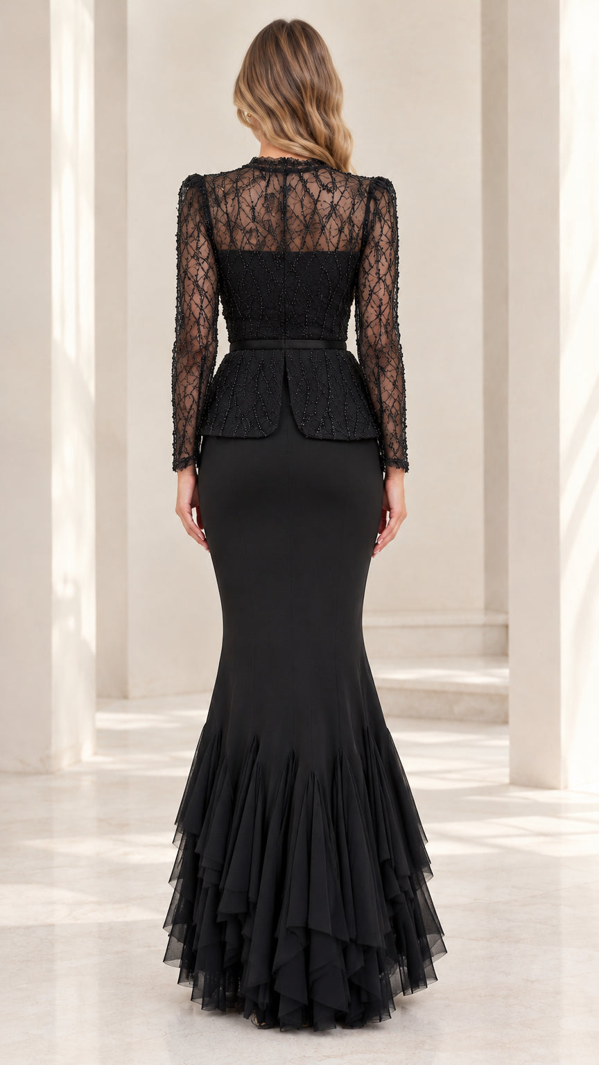 Back view of black illusion lace peplum evening gown with zipper