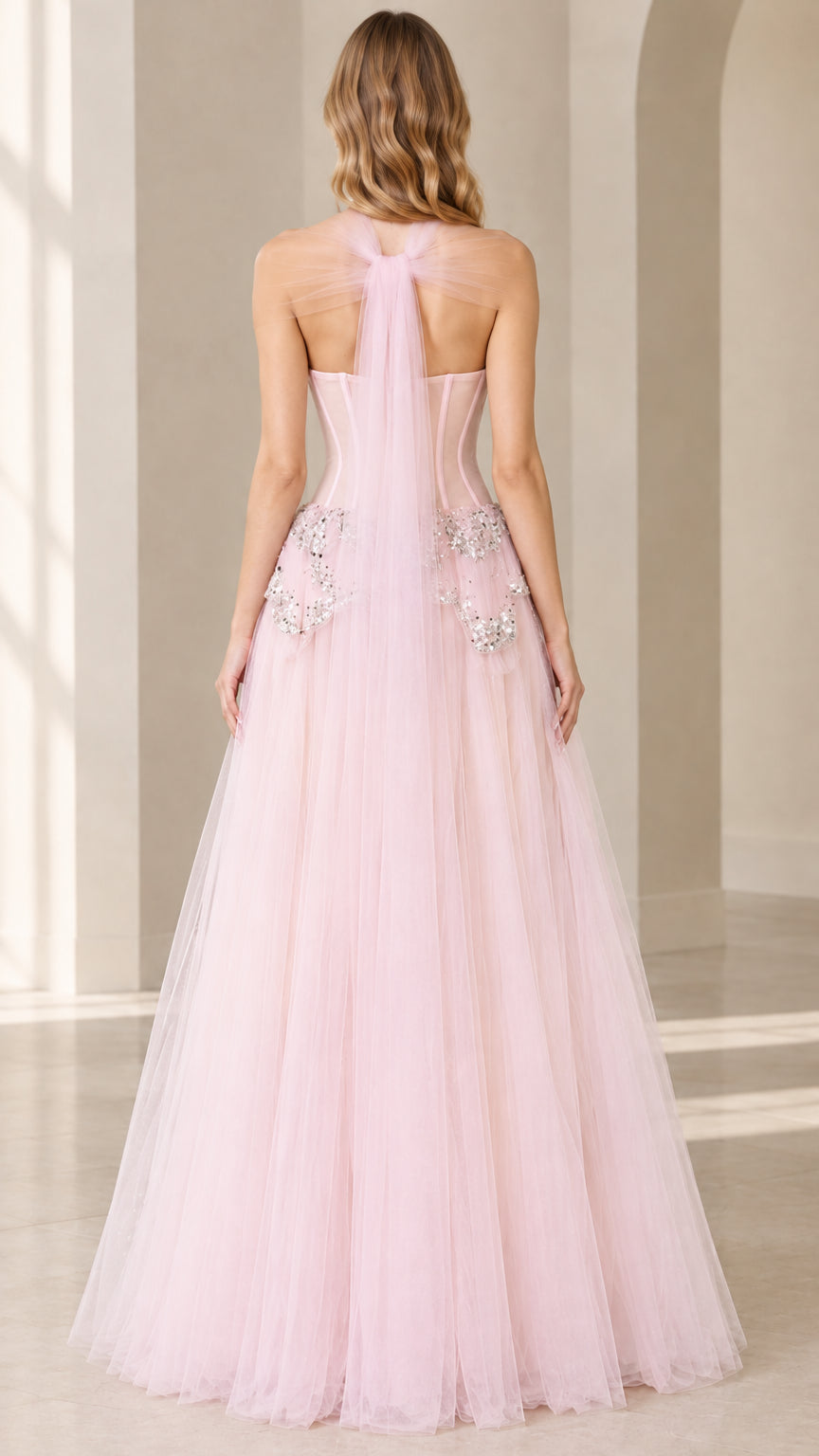 Blush Pink strapless tulle gown back view with tie detail