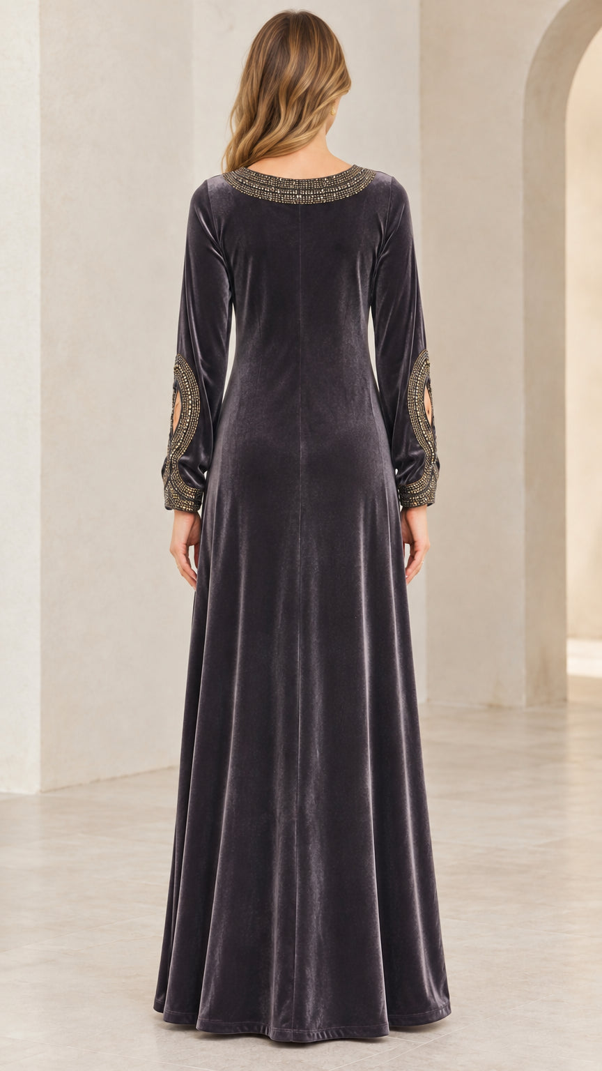 Back view of model in Charcoal Grey full length velvet dress