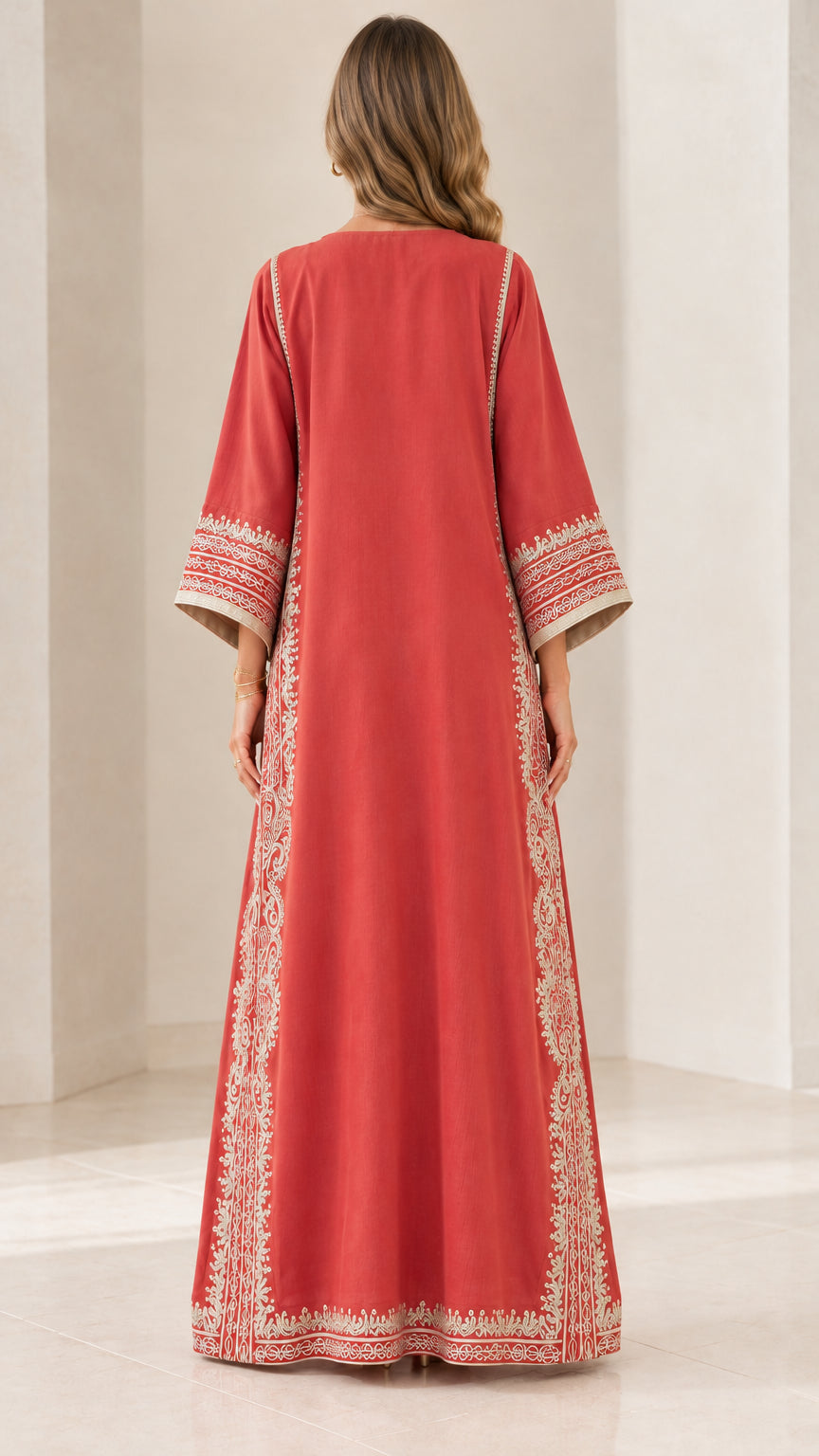 Back view of rust red embroidered floor-length kaftan dress
