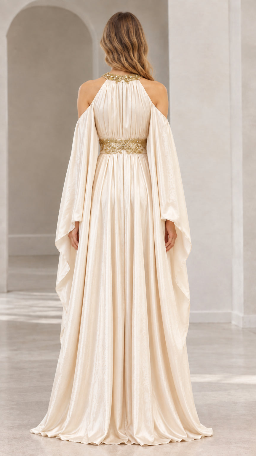 Back view of floor-length champagne formal gown with cape sleeves