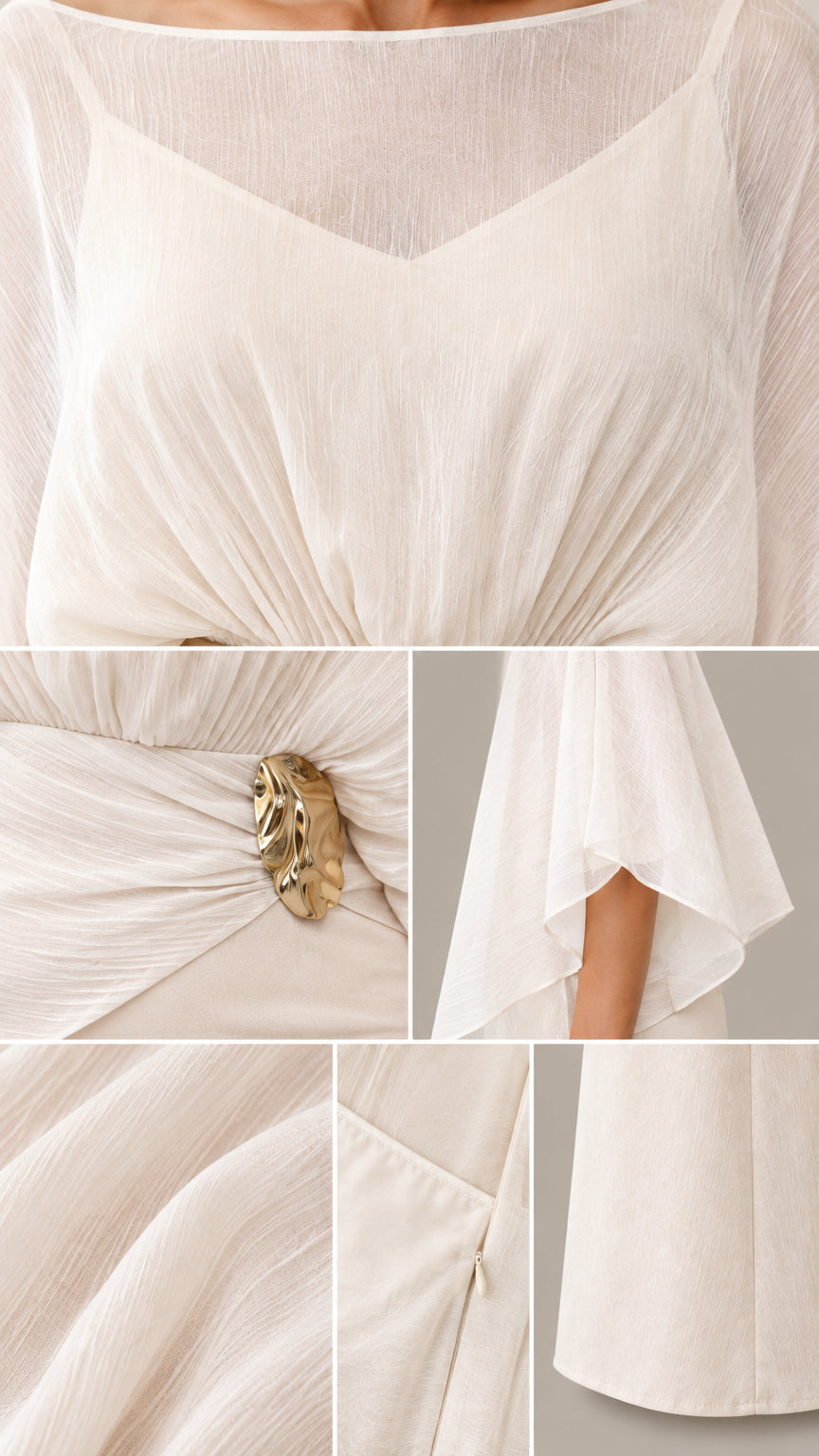 Close-up details of pleated chiffon bodice, metallic brooch, and sheer sleeves