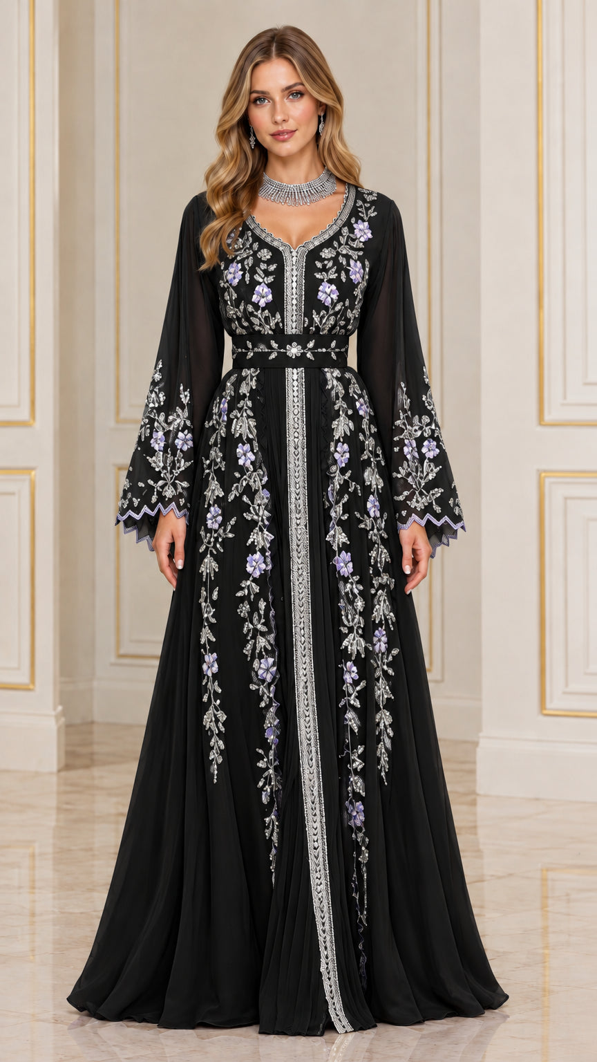 Model wearing black embroidered chiffon kaftan evening dress with bell sleeves
