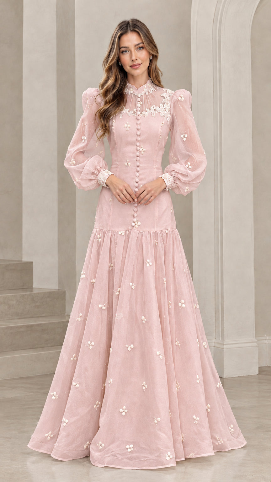 Front view of blush pink long sleeve Victorian lace maxi gown with white floral details