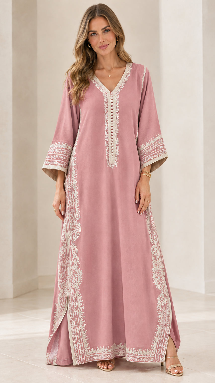 Full-length front view of dusty rose pink embroidered kaftan maxi dress