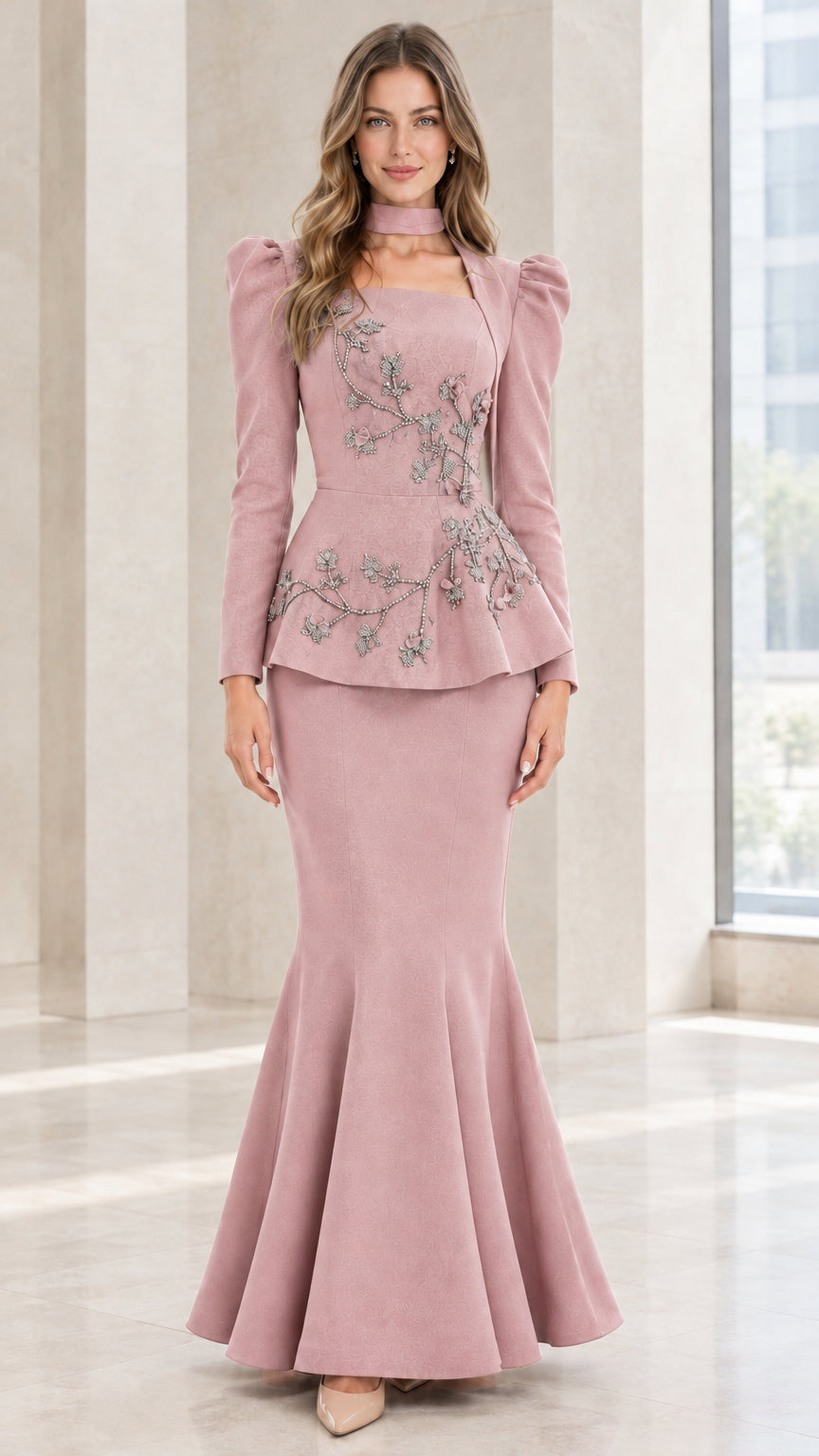 Model wearing Dusty Pink long sleeve peplum evening dress