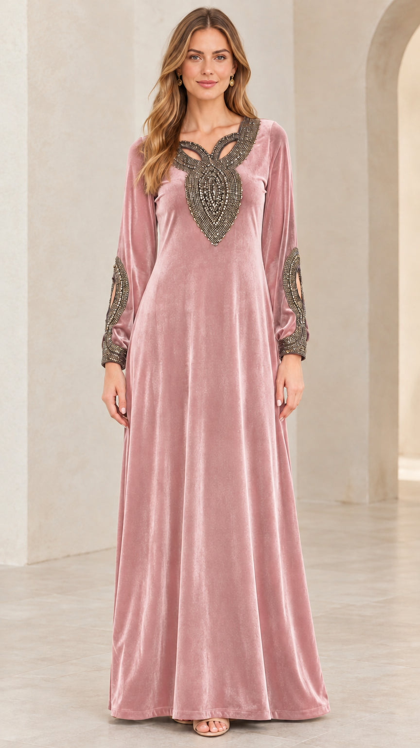 Model wearing Dusty Rose pink velvet embellished maxi gown