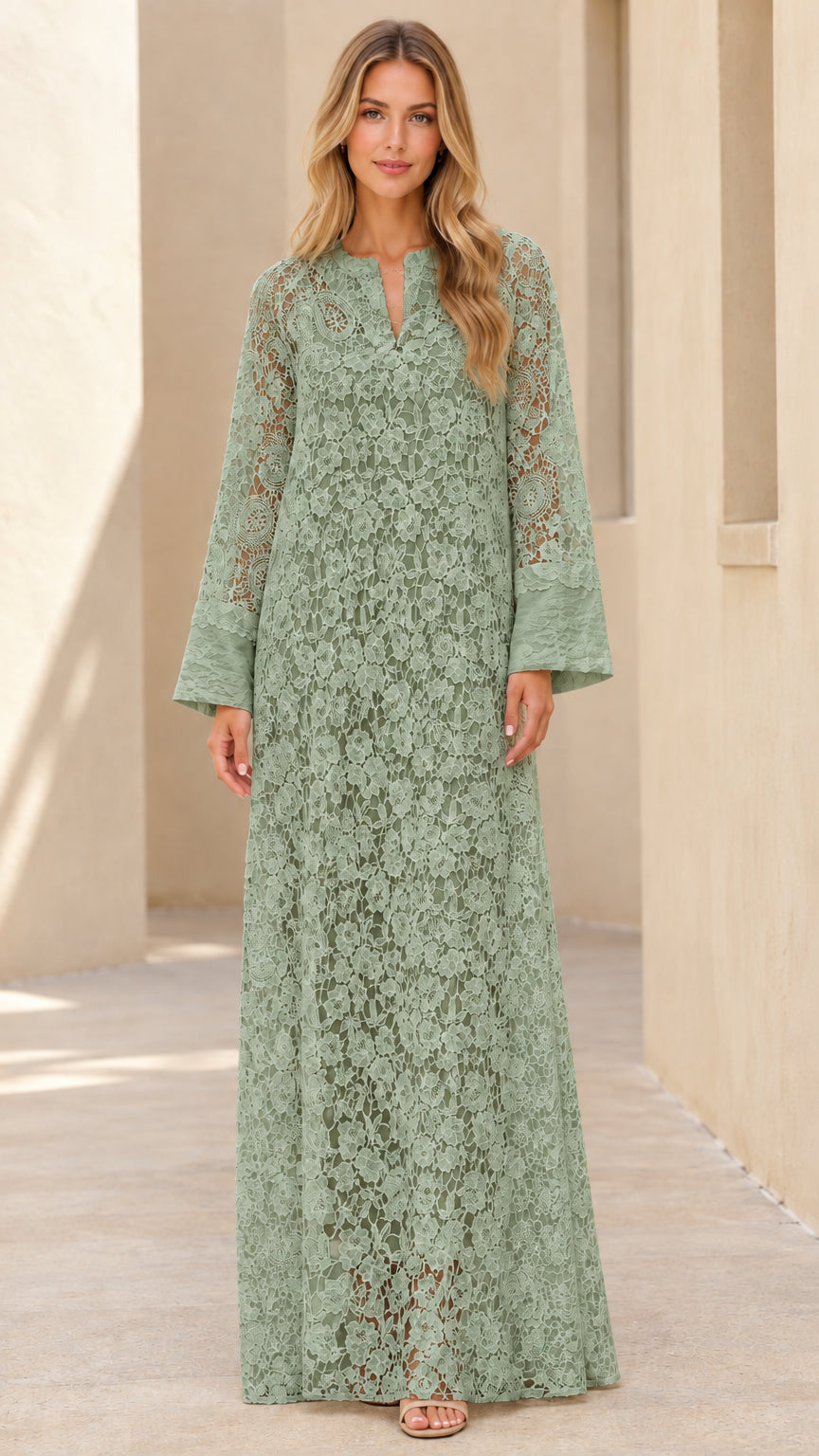 Woman wearing sage green floral lace long sleeve maxi dress