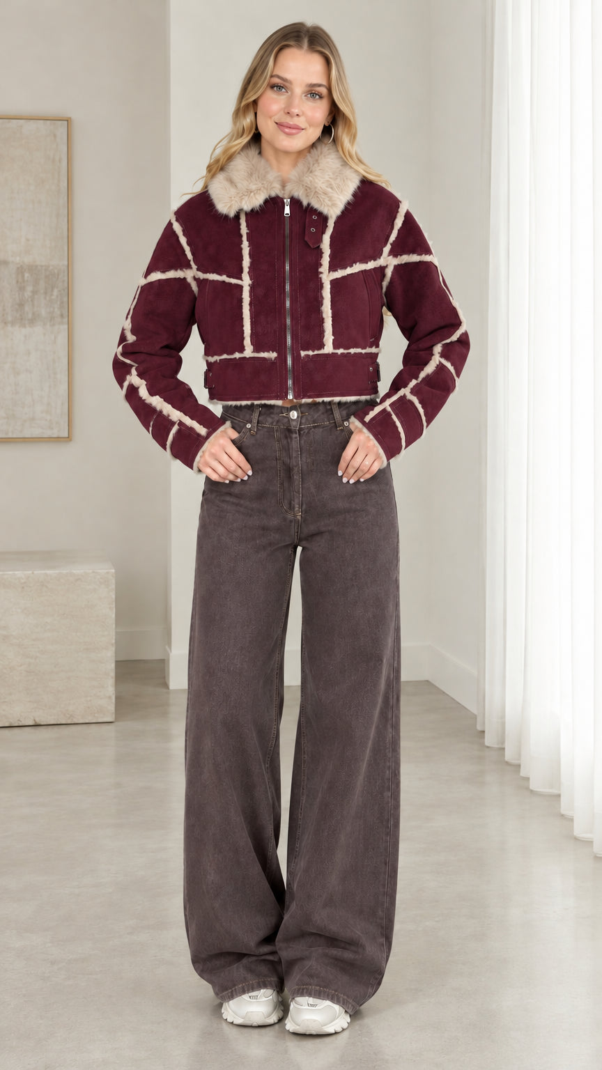 Model wearing burgundy cropped faux suede shearling jacket