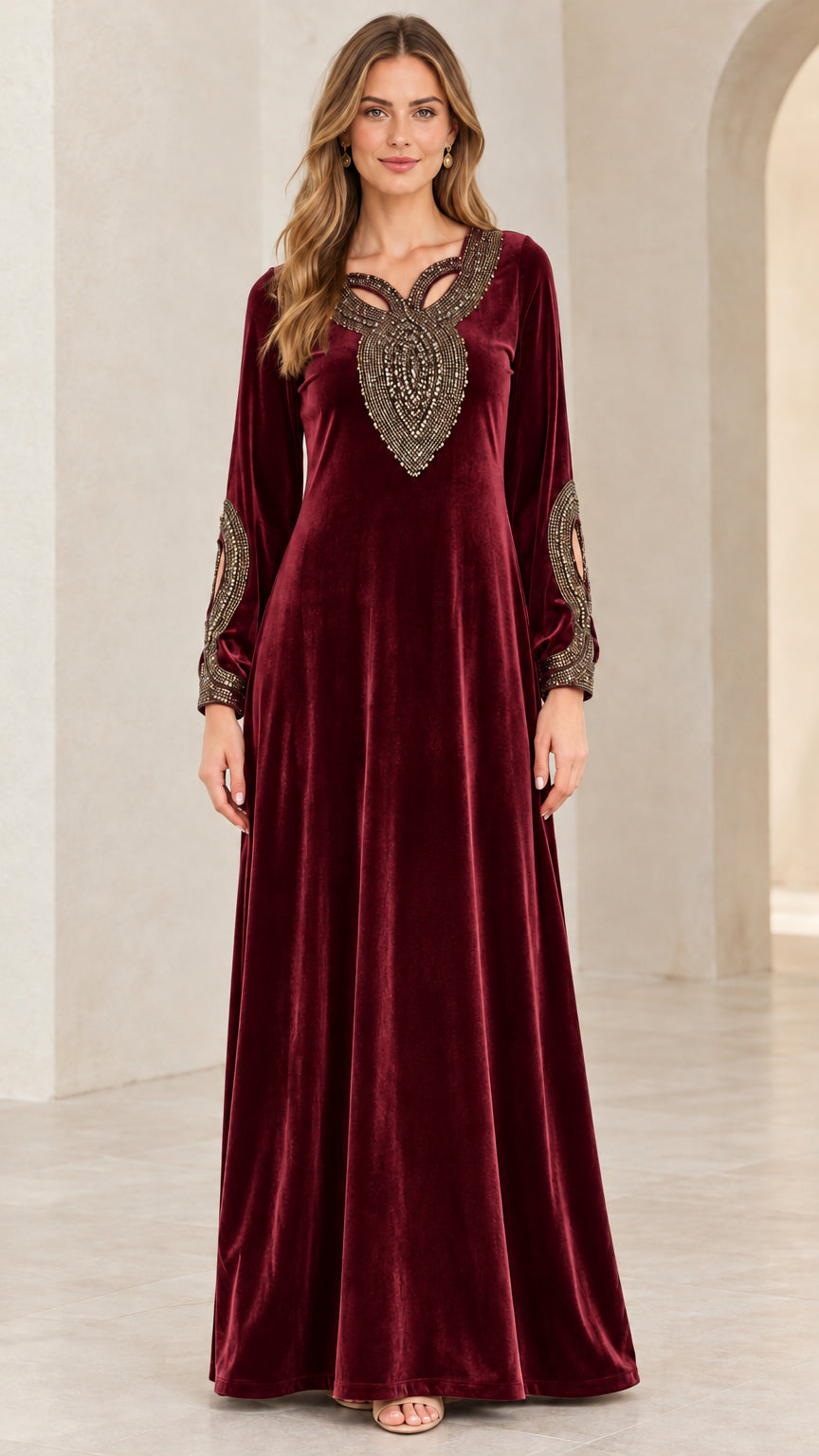 Model wearing Burgundy red velvet embellished formal maxi gown