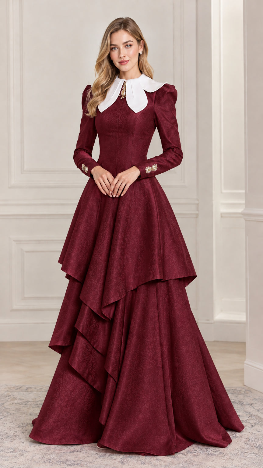 Full-length view of burgundy red tiered long sleeve ball gown with white collar