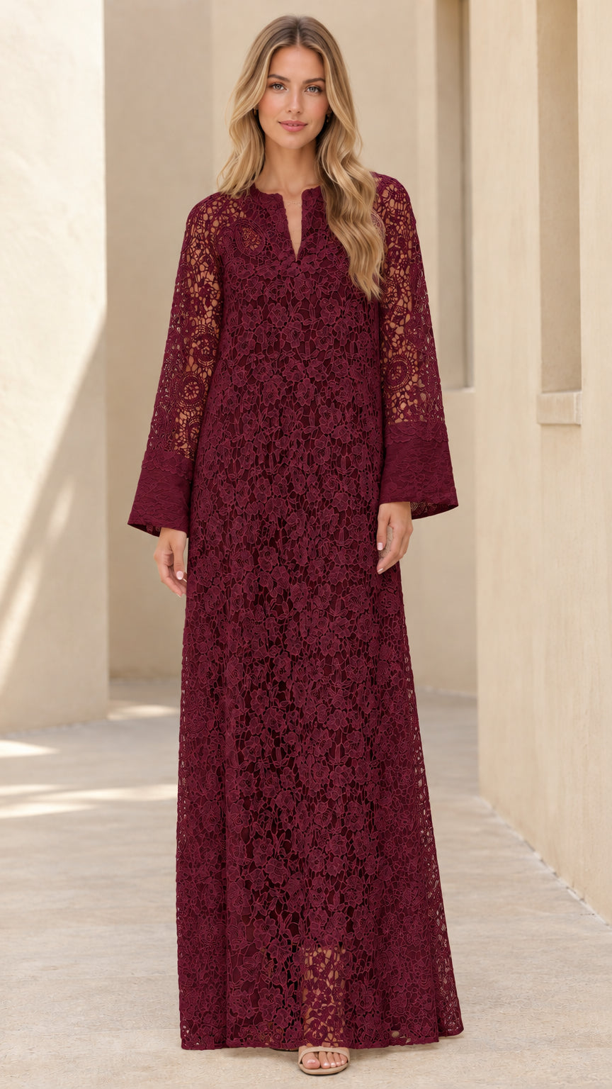 Woman wearing burgundy wine red floral lace long sleeve maxi dress