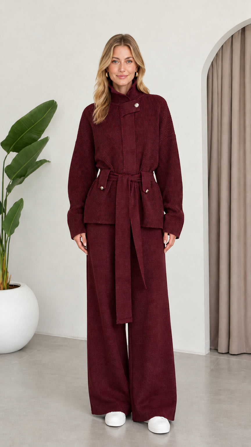 Full front view of model wearing the Burgundy ribbed knit belted two-piece set
